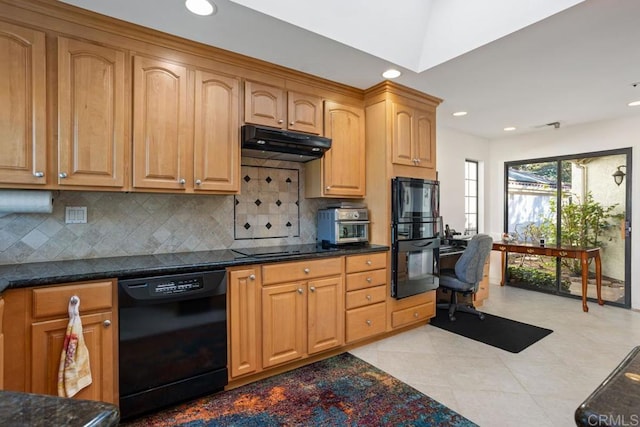 kitchen featuring decorative backsplash, dark stone counters, and black appliances