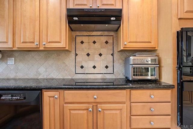 kitchen featuring decorative backsplash and black appliances