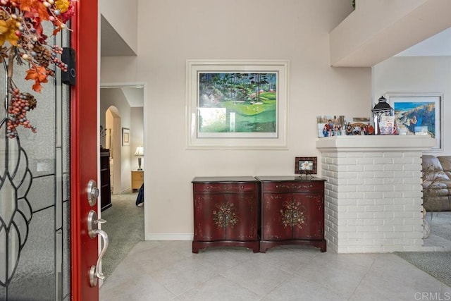 interior space with light tile patterned floors