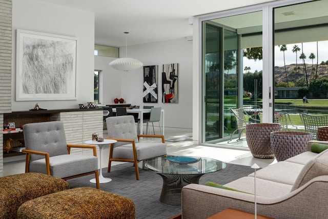 living room with floor to ceiling windows