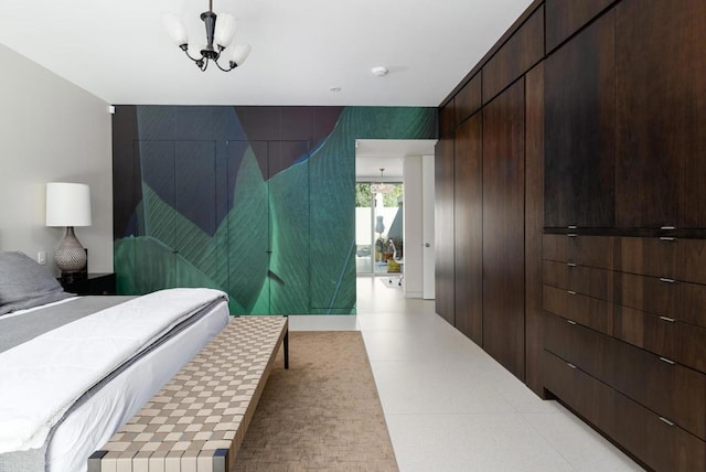 bedroom with an inviting chandelier