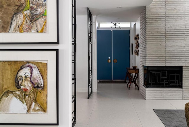 hallway featuring light tile patterned flooring