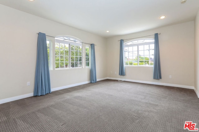 empty room featuring carpet