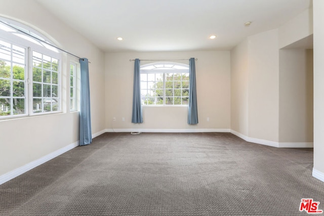 view of carpeted spare room