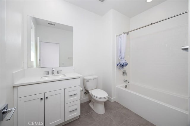 full bathroom featuring toilet, tile patterned floors, vanity, and shower / bathtub combination with curtain