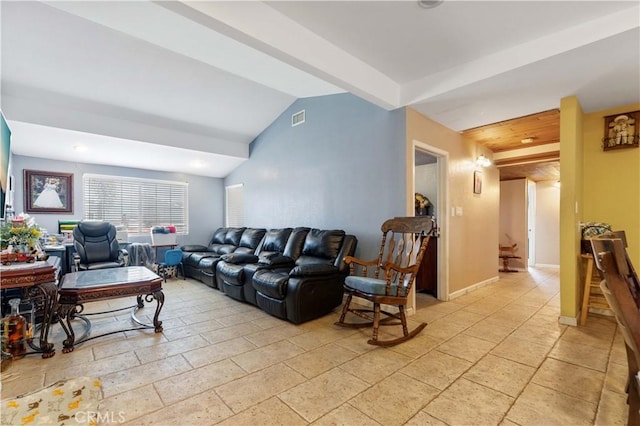 living room featuring vaulted ceiling