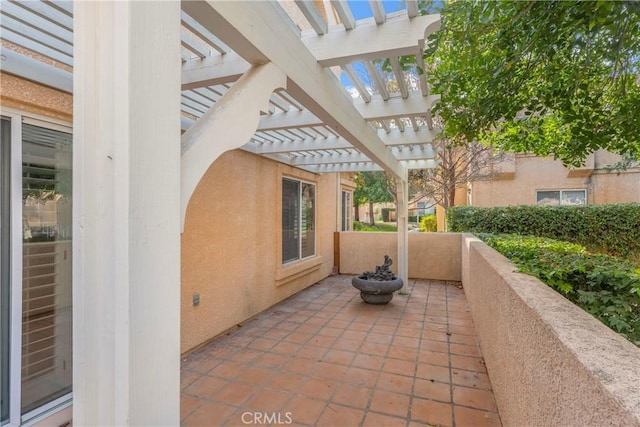 view of patio featuring a pergola