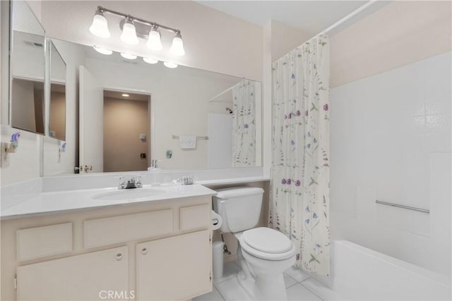 full bathroom with vanity, toilet, tile patterned flooring, and shower / bath combo with shower curtain