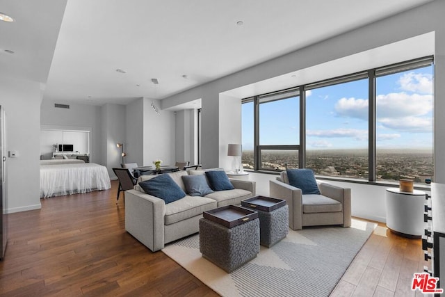 bedroom with hardwood / wood-style floors