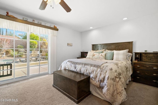 carpeted bedroom with access to outside and ceiling fan