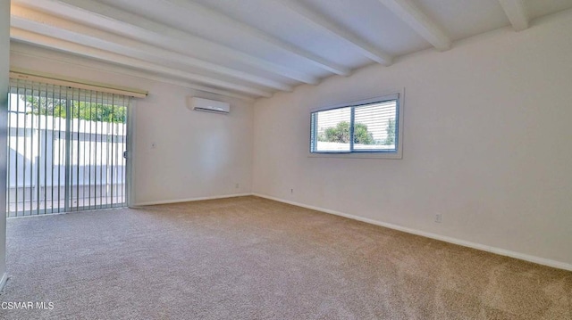 empty room with beamed ceiling, a wall mounted AC, and carpet