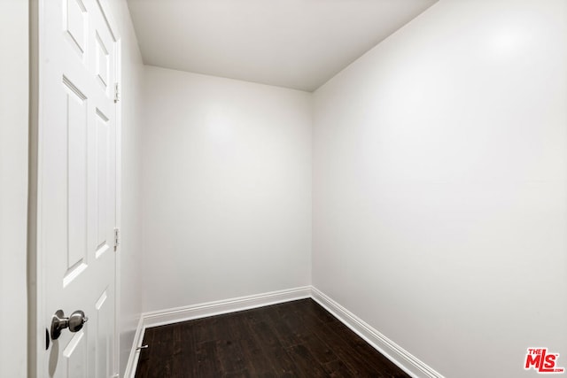 unfurnished room featuring wood-type flooring