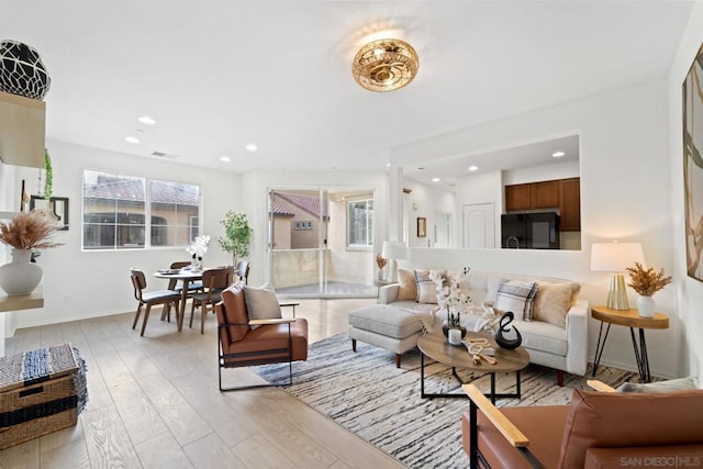 living room featuring light wood-type flooring