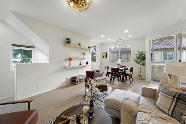 living room with light hardwood / wood-style floors