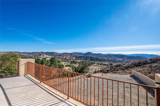 balcony featuring a mountain view