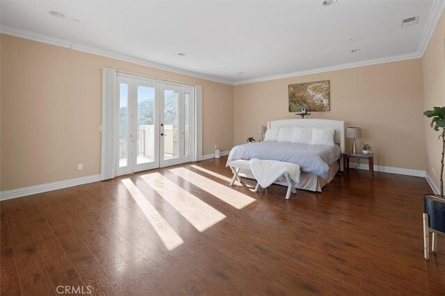 bedroom featuring baseboards, wood finished floors, access to outside, and french doors