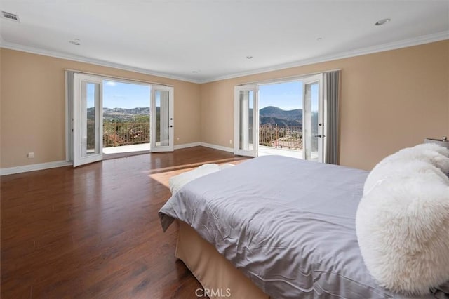 9455 Hierba Rd, Agua Dulce, CA 91390 - bedroom with access to exterior, wood finished floors, ornamental molding, and a mountain view