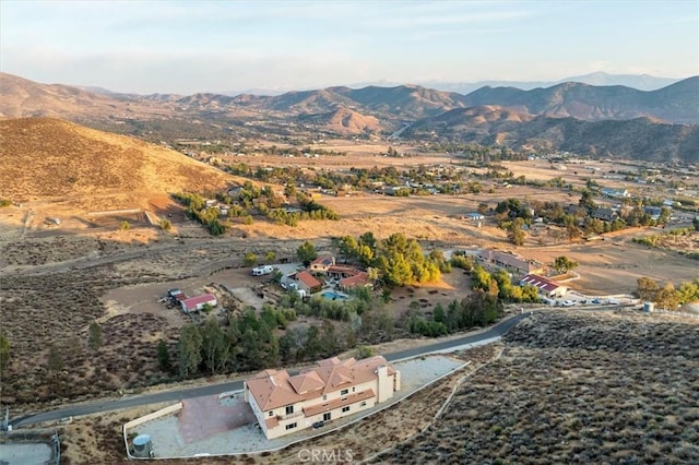 drone / aerial view featuring a mountain view