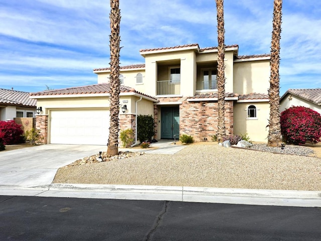 view of front of property featuring a garage and a balcony