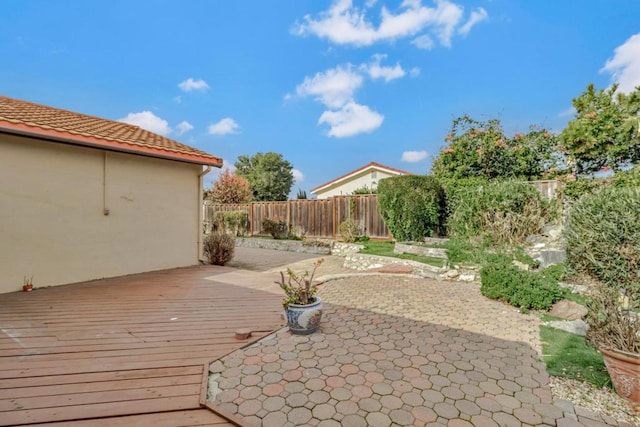 view of patio / terrace featuring a wooden deck