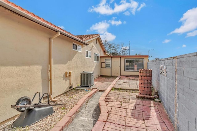 view of patio with central AC