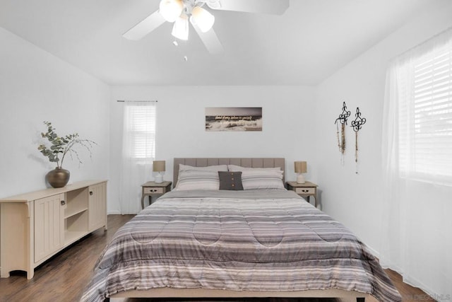 bedroom featuring dark hardwood / wood-style floors and ceiling fan