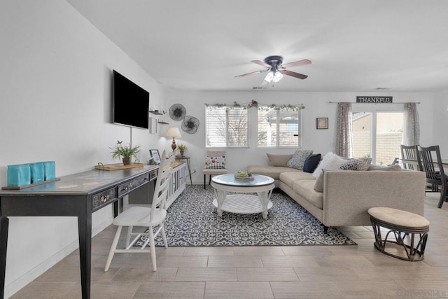 living room with ceiling fan