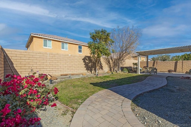 view of yard with a patio and a pergola