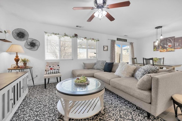 living room with ceiling fan