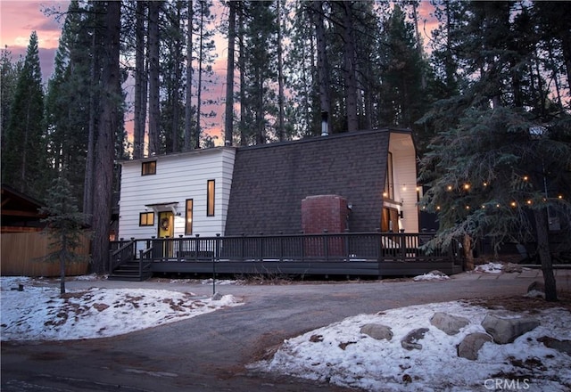 exterior space featuring a wooden deck