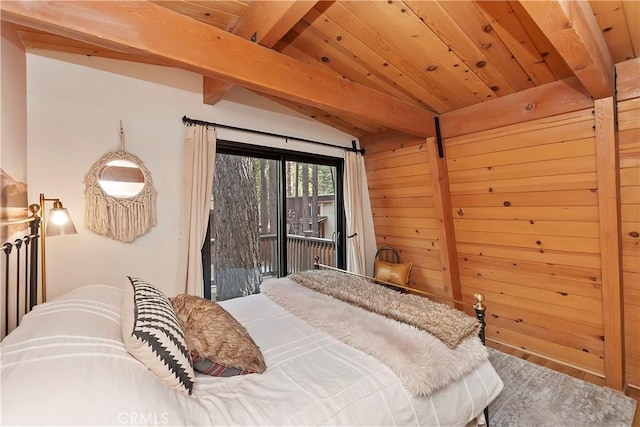 bedroom featuring wood ceiling, vaulted ceiling with beams, wood walls, and access to outside