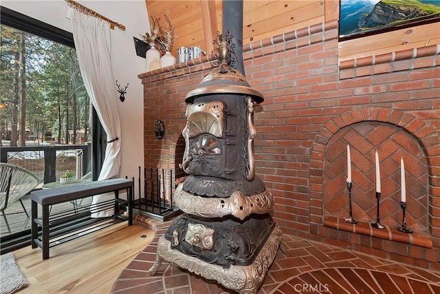 sitting room featuring a fireplace and wood-type flooring