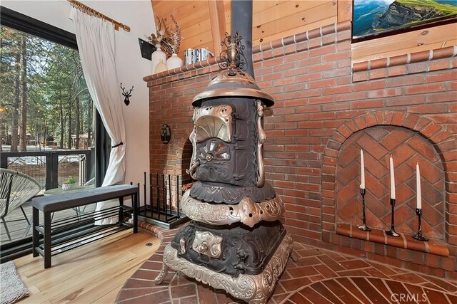 room details with a fireplace and wood finished floors