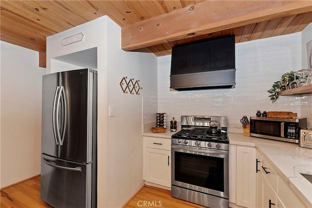 kitchen with wooden ceiling, custom range hood, appliances with stainless steel finishes, open shelves, and backsplash