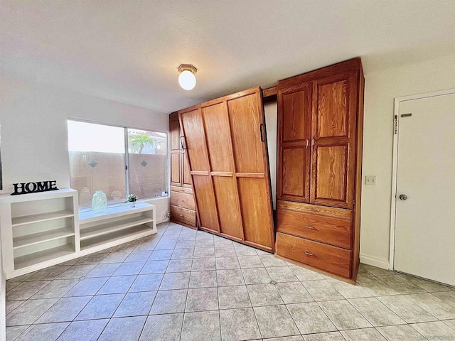 interior space with tile patterned floors