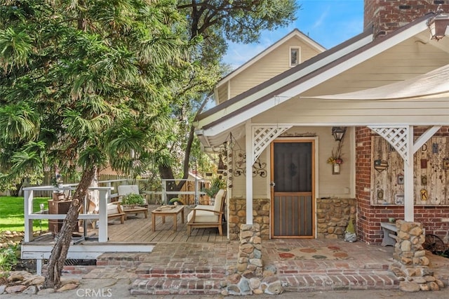 doorway to property featuring a patio