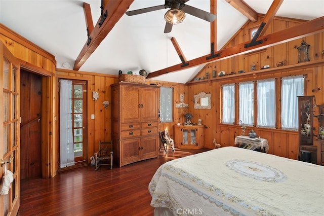 bedroom featuring lofted ceiling with beams, dark wood-type flooring, and ceiling fan