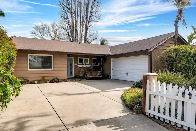 single story home with a garage