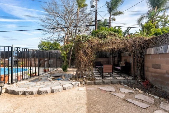 view of patio / terrace featuring a covered pool