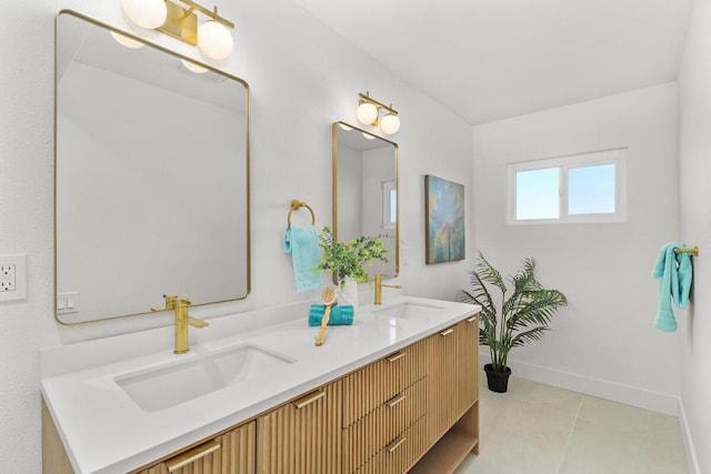 bathroom with vanity and tile patterned floors