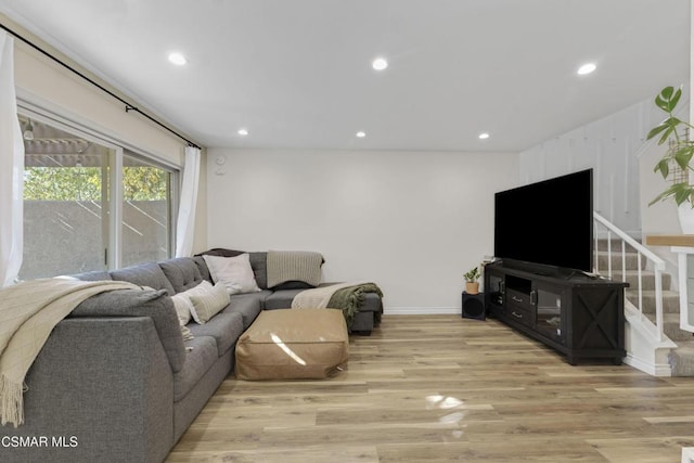 living room with light hardwood / wood-style floors