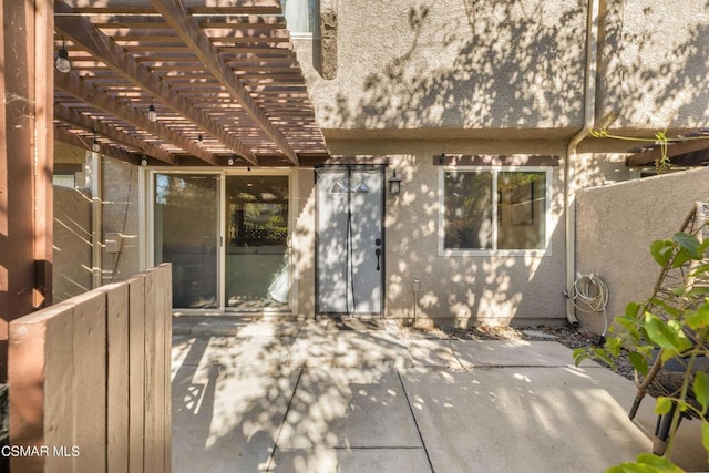 view of patio featuring a pergola