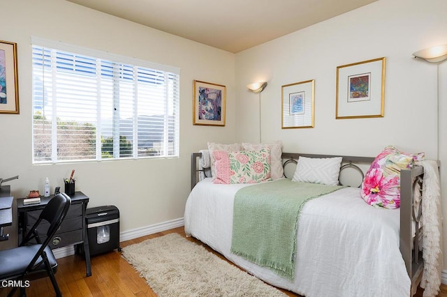 bedroom featuring hardwood / wood-style flooring