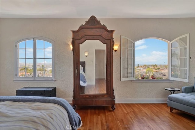 bedroom featuring wood-type flooring