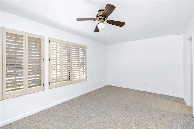 unfurnished bedroom featuring carpet floors, ceiling fan, and baseboards