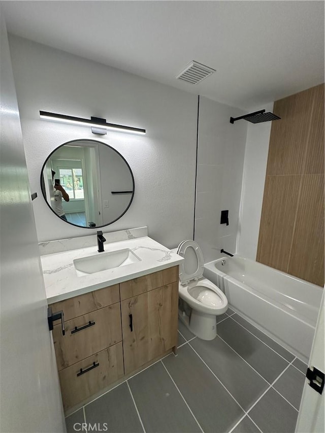 full bathroom featuring vanity, tile patterned flooring, shower / bathtub combination, and toilet