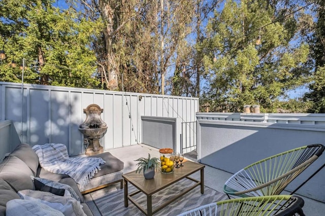 deck featuring a pool, outdoor lounge area, and a patio