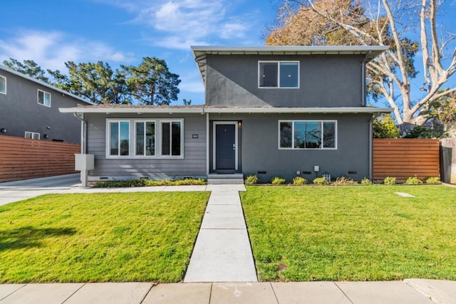 view of front property featuring a front lawn