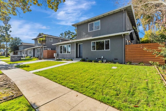 front of property featuring a front lawn