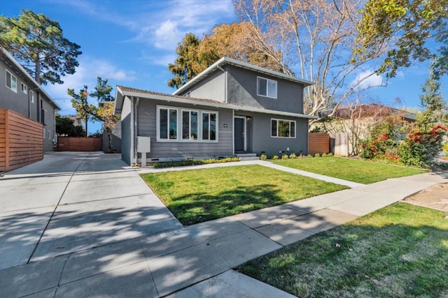 view of front of property with a front lawn